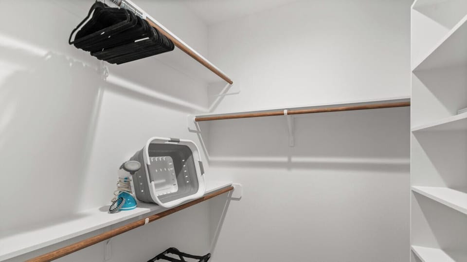 Roomy walk-in closet that handles overpacking