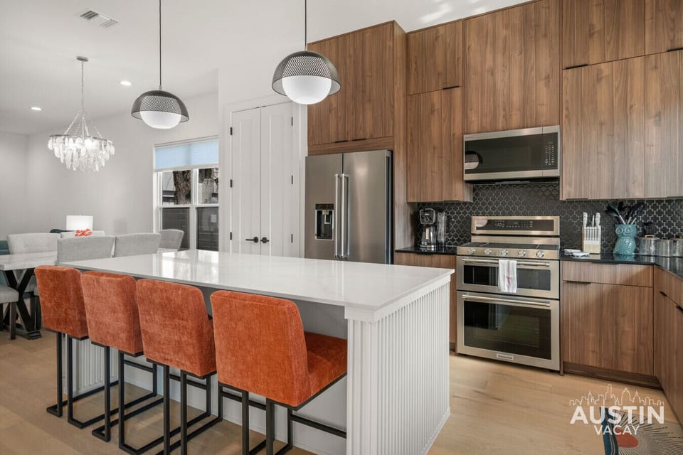Oversized island with seating, steps from dining