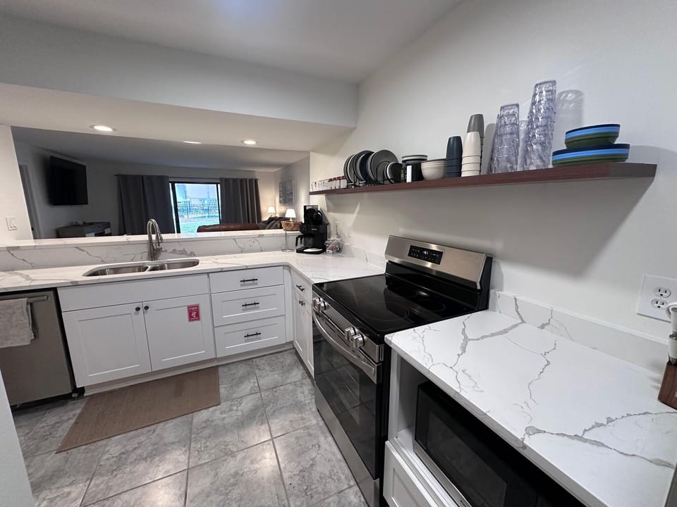The kitchen is fully furnished and ready for home-cooked whether it's quick recipes or for a celebration.
