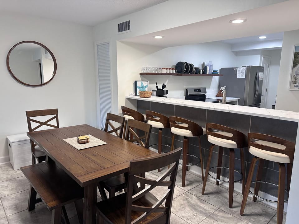 Extra seating by the bar with stools