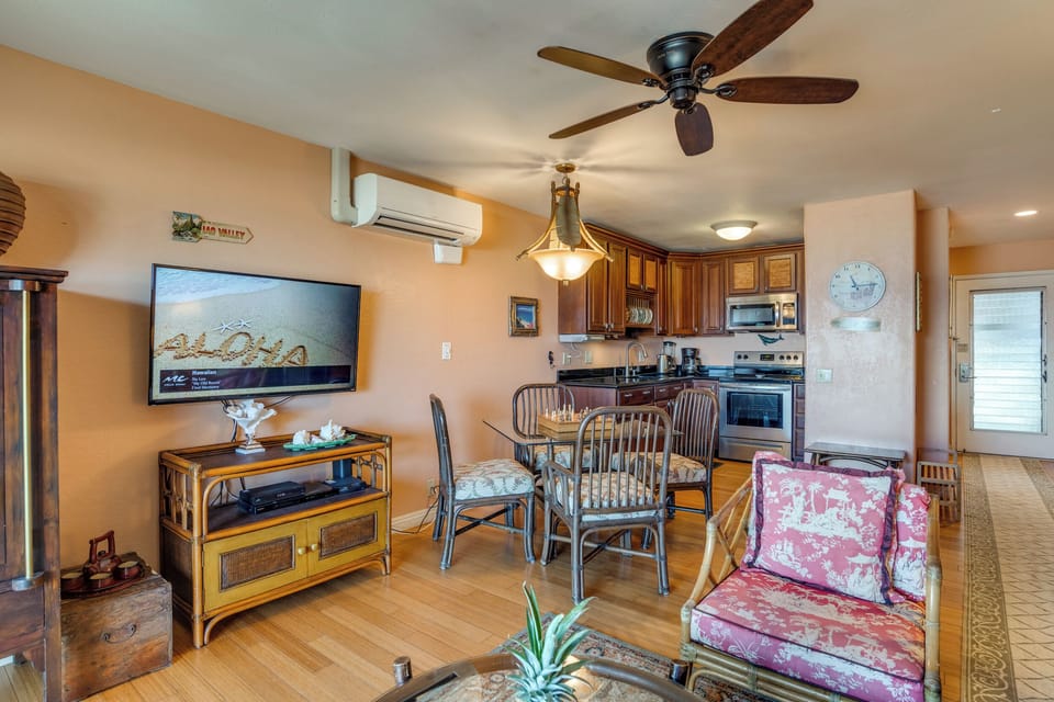 View of the dining area and kitchen from the living room