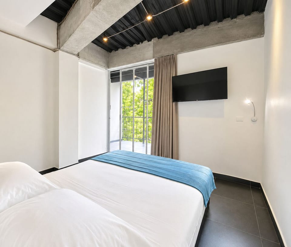 Blackout drapes, iron/ironing board, free WiFi, bed sheets