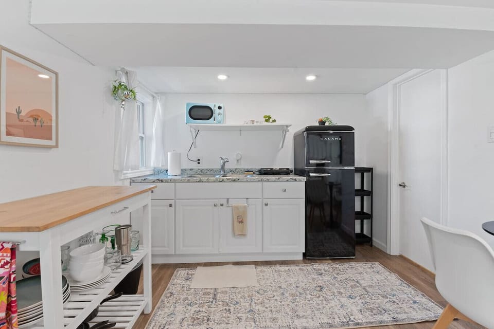 Well-equipped kitchenette within the studio space