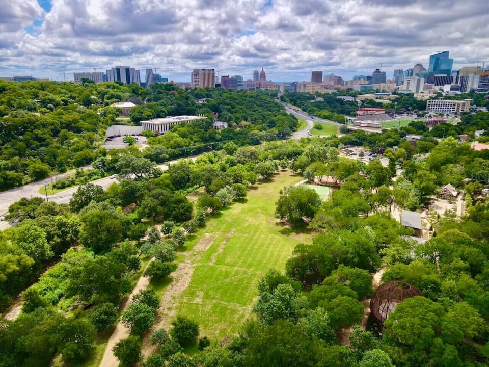 Experience Pease Park, a green urban escape along Austin`s Shoal Creek and just a short stroll away. With scenic trails, open lawns, and tree-filled spaces, it’s perfect for picnics, relaxation, and unwinding close to the heart of the city.
