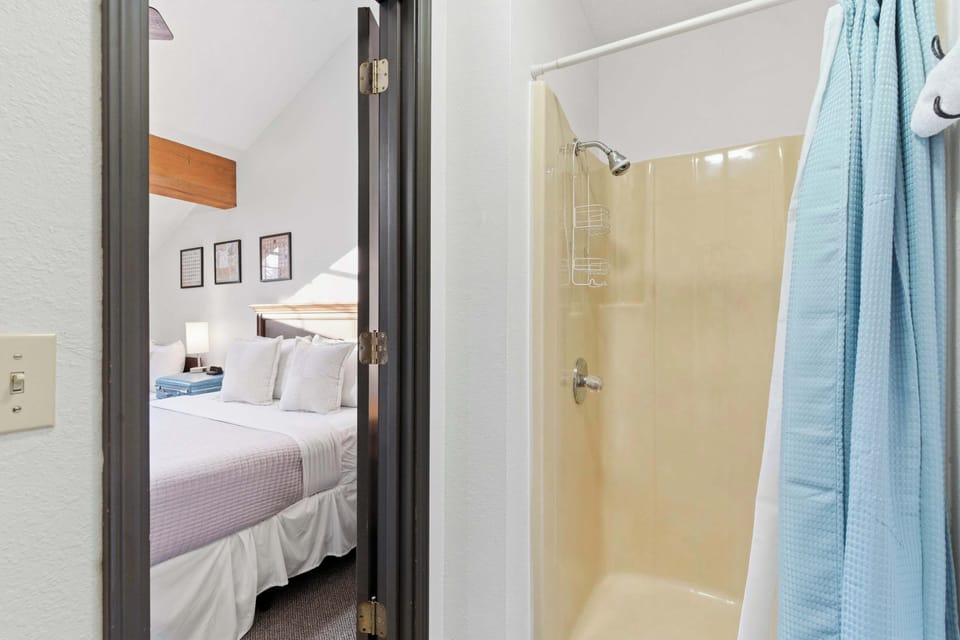 Private ensuite bathroom with a refreshing shower.