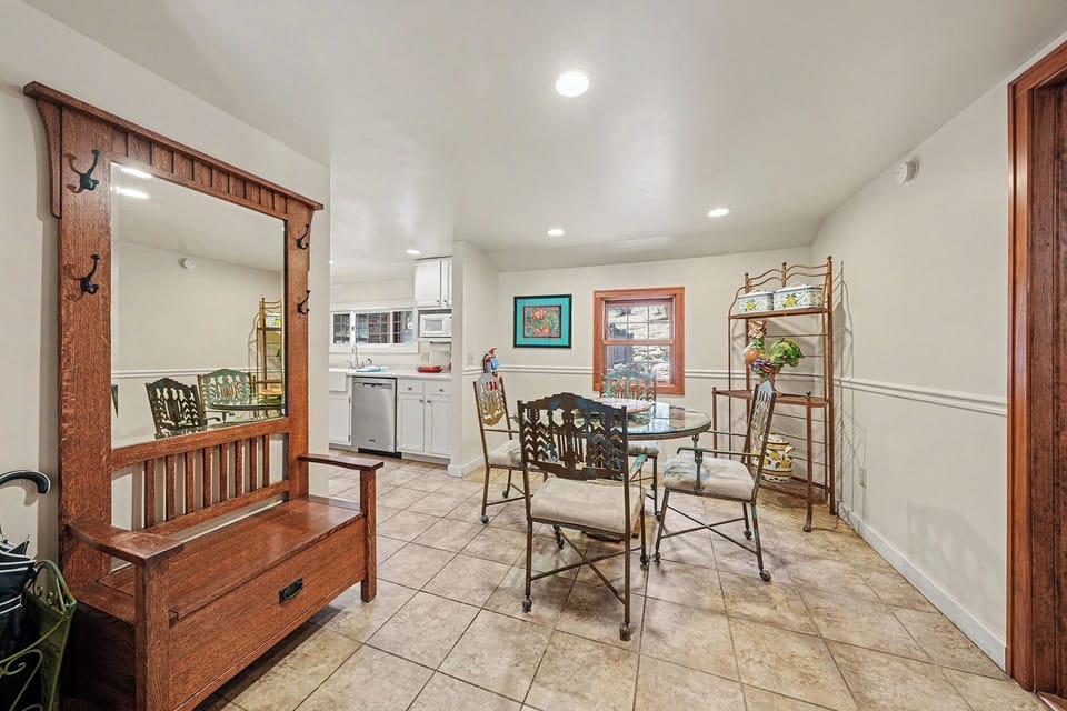 Step into your bright, open living space where rustic charm meets modern comfort—perfect for morning coffee or evening meals together.