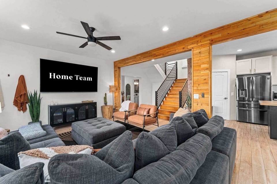 Comfy couches, soft throws, and zero stress—our living room is basically a hug in room form. Perfect for making memories or just doing… absolutely nothing.