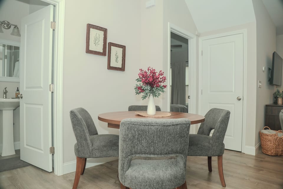 Enjoy intimate meals or lively conversation in the dining nook just steps from the kitchen. With comfortable seating and accommodations for eight, every meal becomes part of the experience.