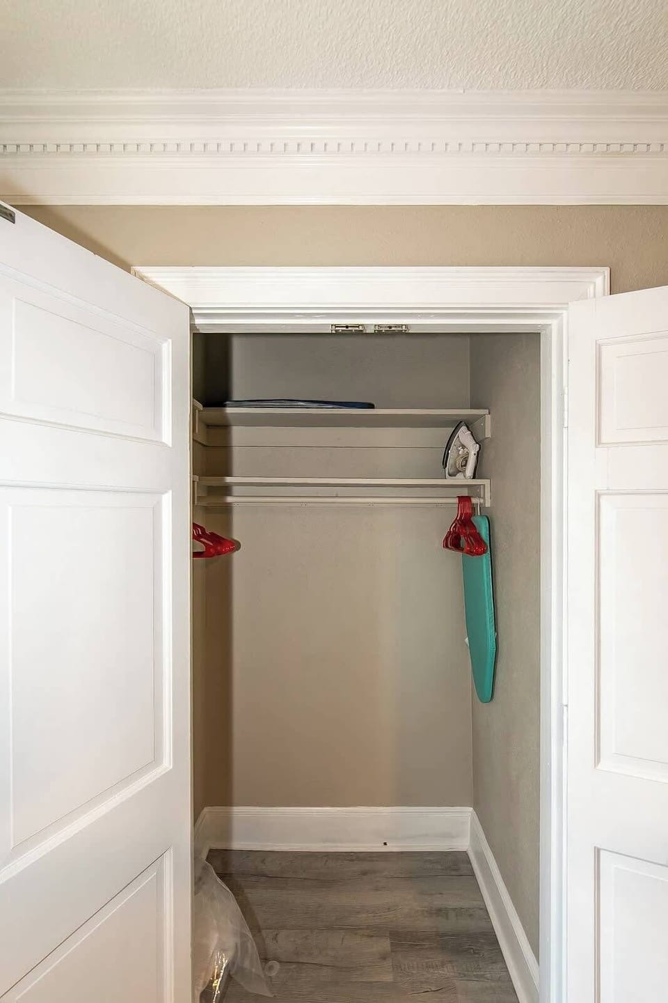 Closet with ironing desk and hangers