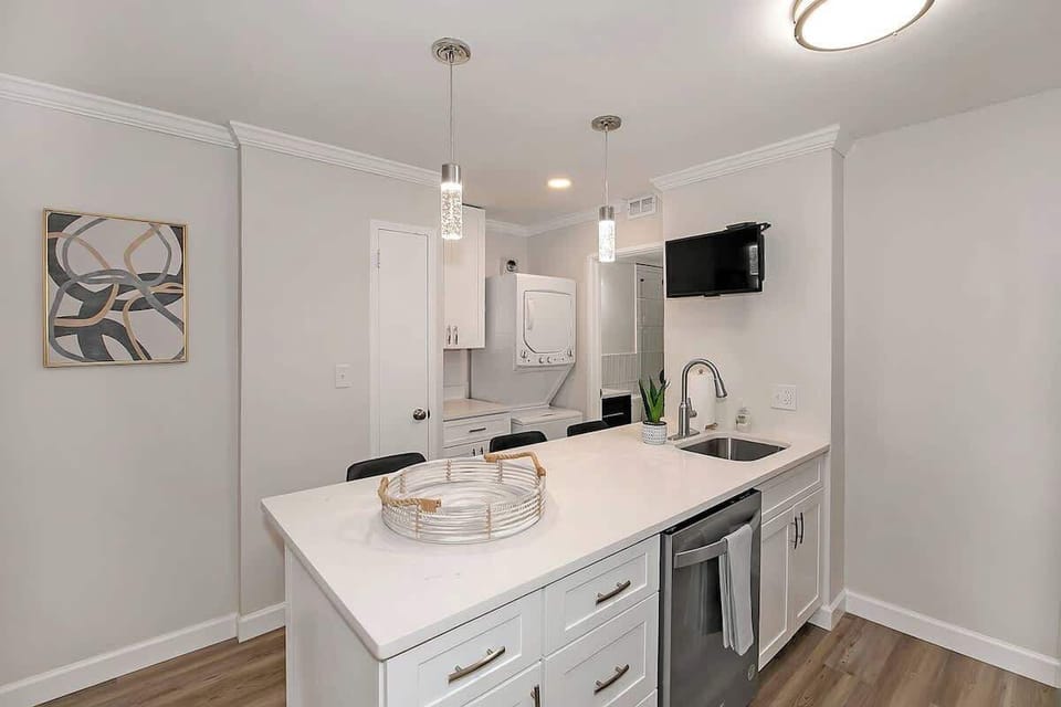 Washer and drier are in the condo