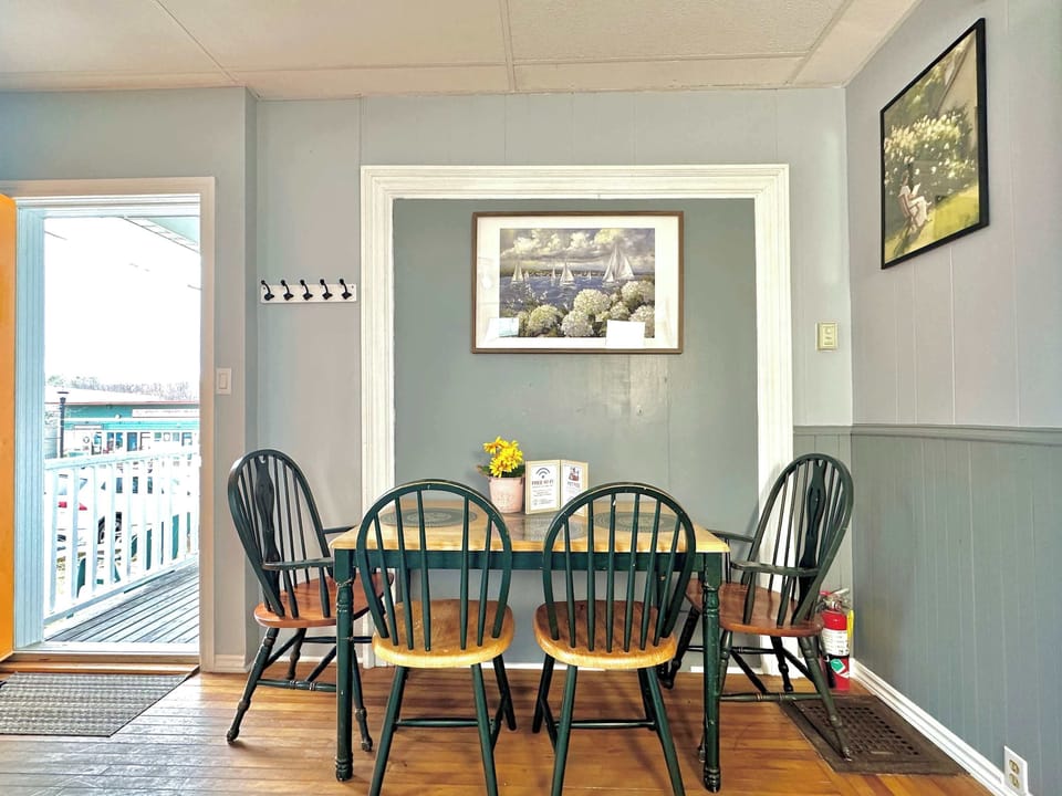 Dining table near the kitchen and entry way