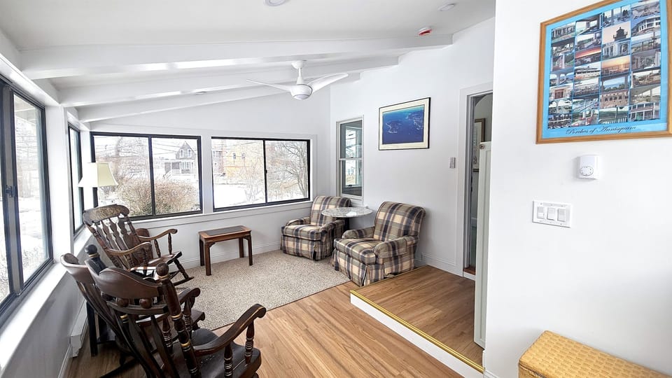 Kick back in the sunny indoor porch area!