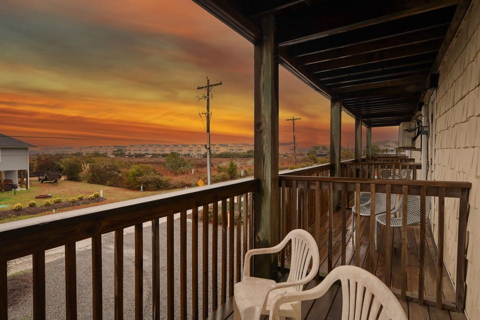 Private balcony seating with beautiful sunset views, the perfect spot to relax after a day of exploring