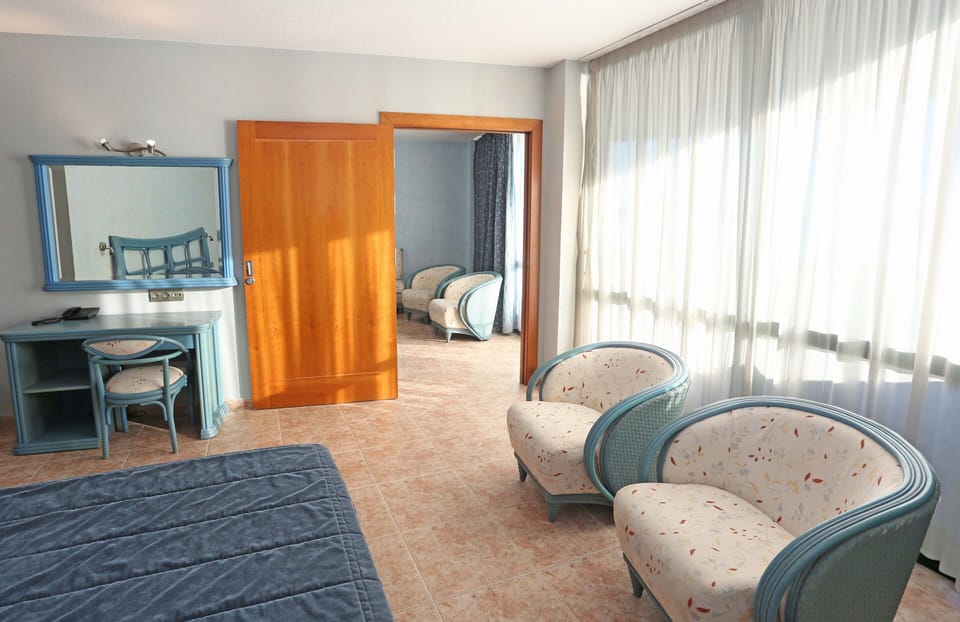 Junior Suite, Balcony, Sea View | Minibar, in-room safe, free WiFi, bed sheets