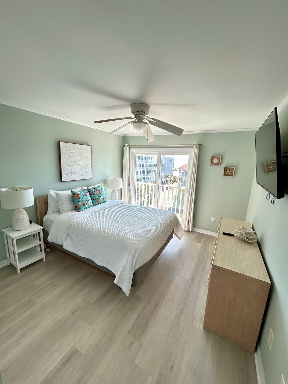 Master Bedroom with Queen Size Bed, sliding glass doors to open for the fresh ocean air.