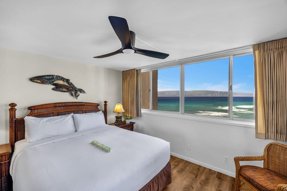 Bright and airy bedroom layout designed to maximize the stunning views of the Maui coastline.