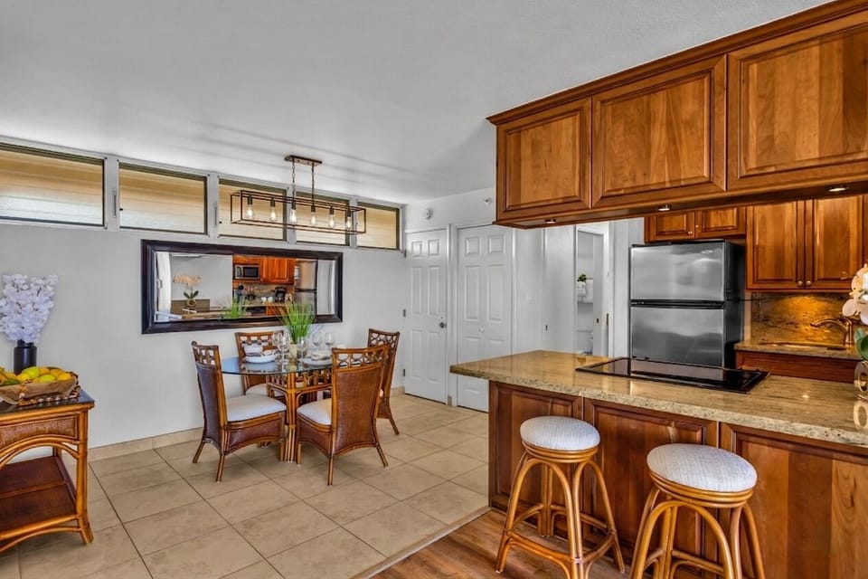 Comfortable dining nook set just off the kitchen, offering a welcoming atmosphere for any mealtime