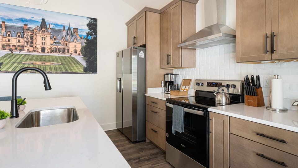 Kitchen is outfitted with an electric range