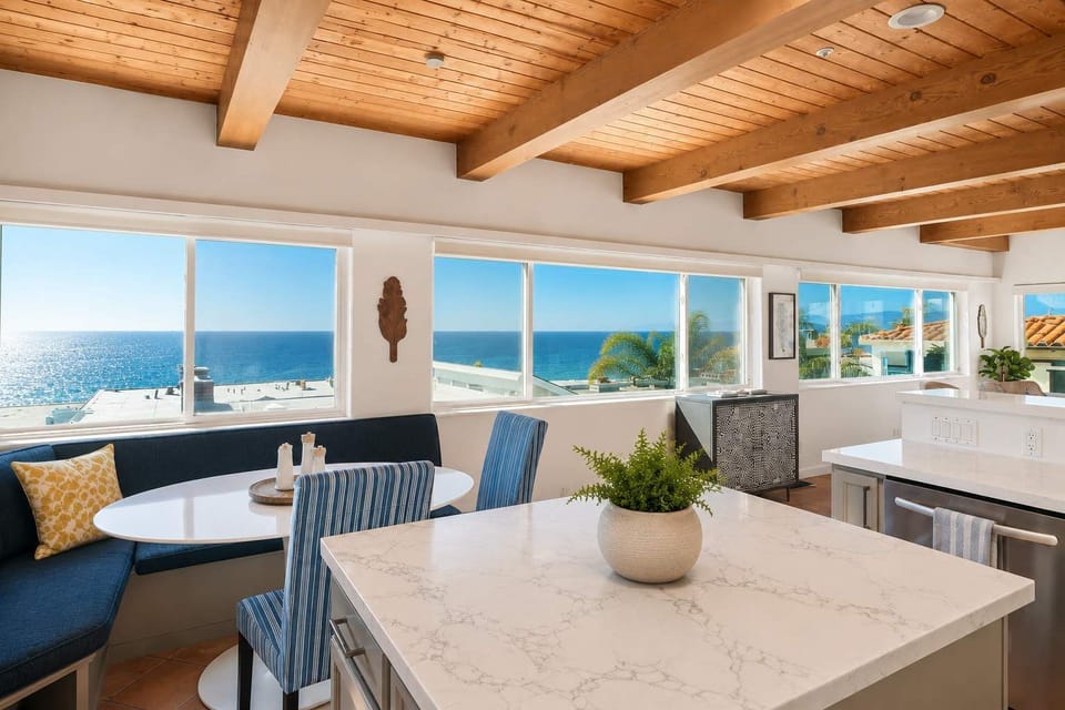 Coastal Living at Its Finest. Enjoy panoramic ocean vistas from your own elevated beachside home