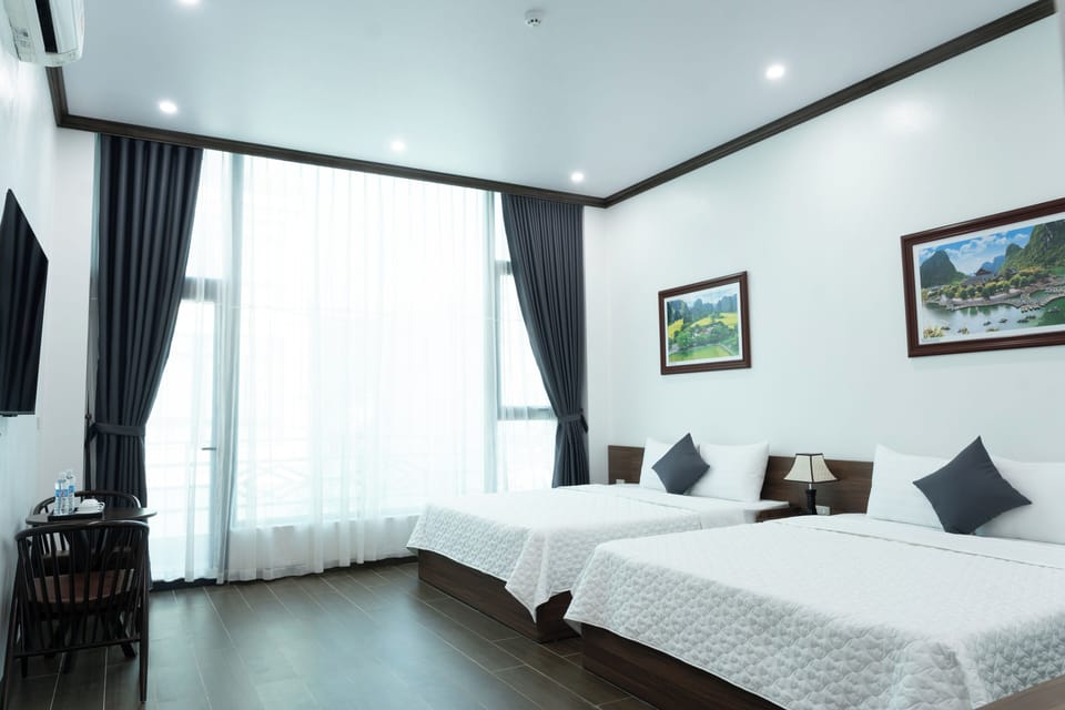 Deluxe Family Room | Desk, laptop workspace, blackout drapes, soundproofing