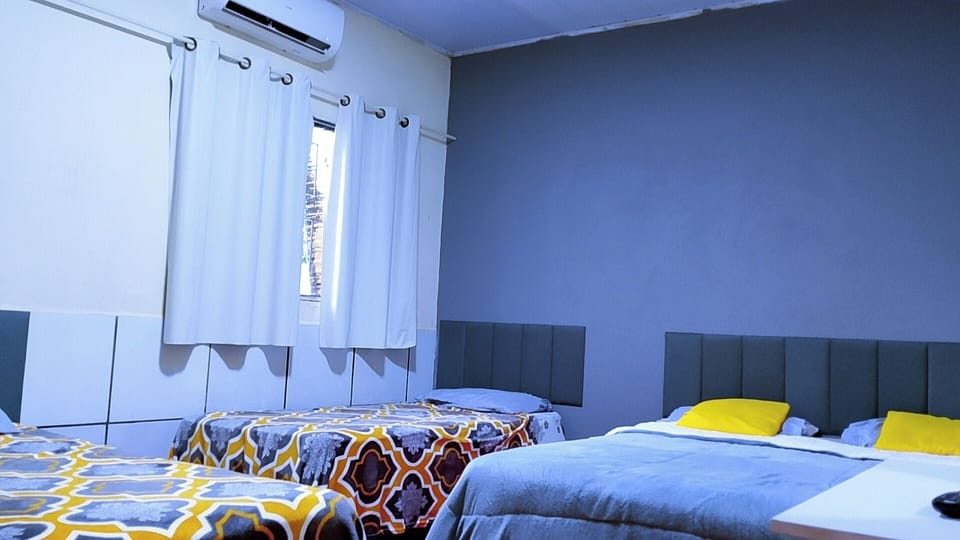 Comfort Quadruple Room, Pool View | Hypo-allergenic bedding, free WiFi