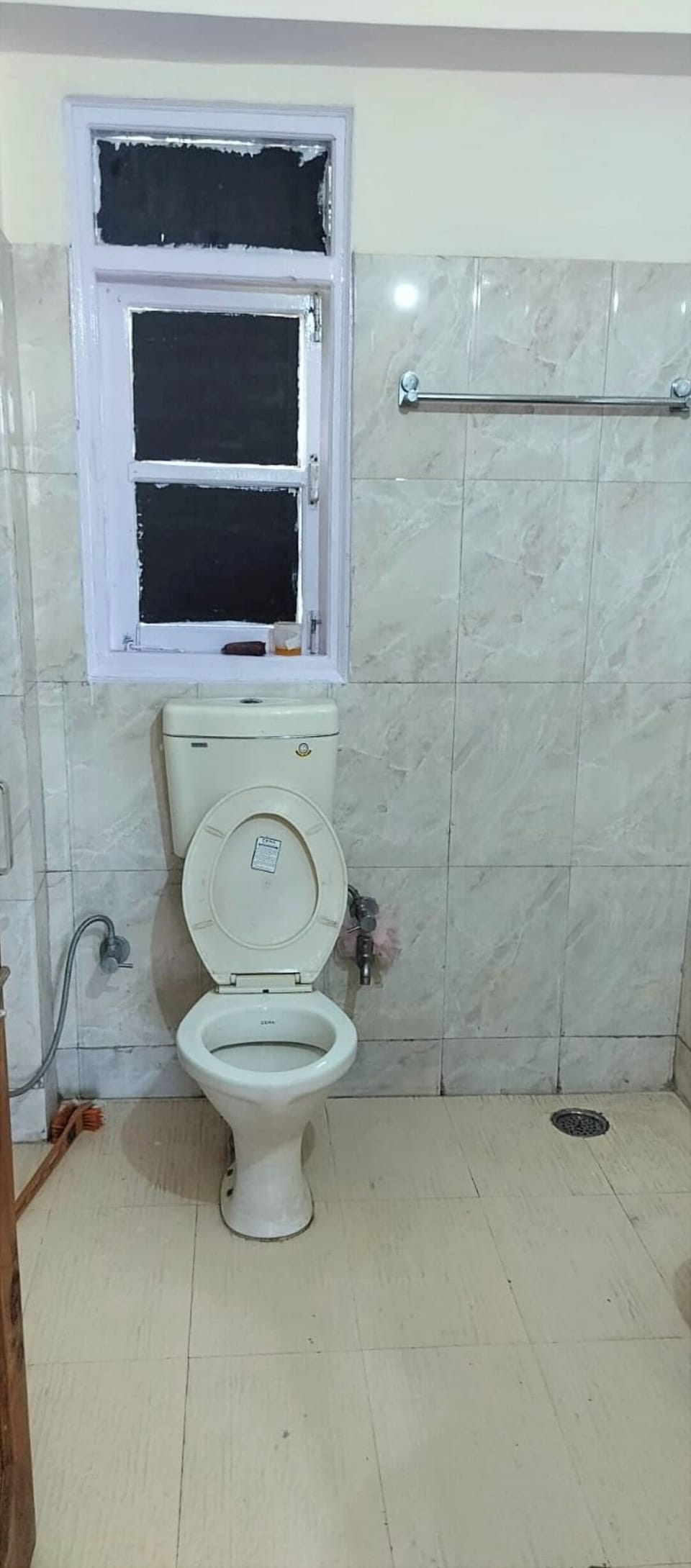 Shower, rainfall showerhead, slippers, towels