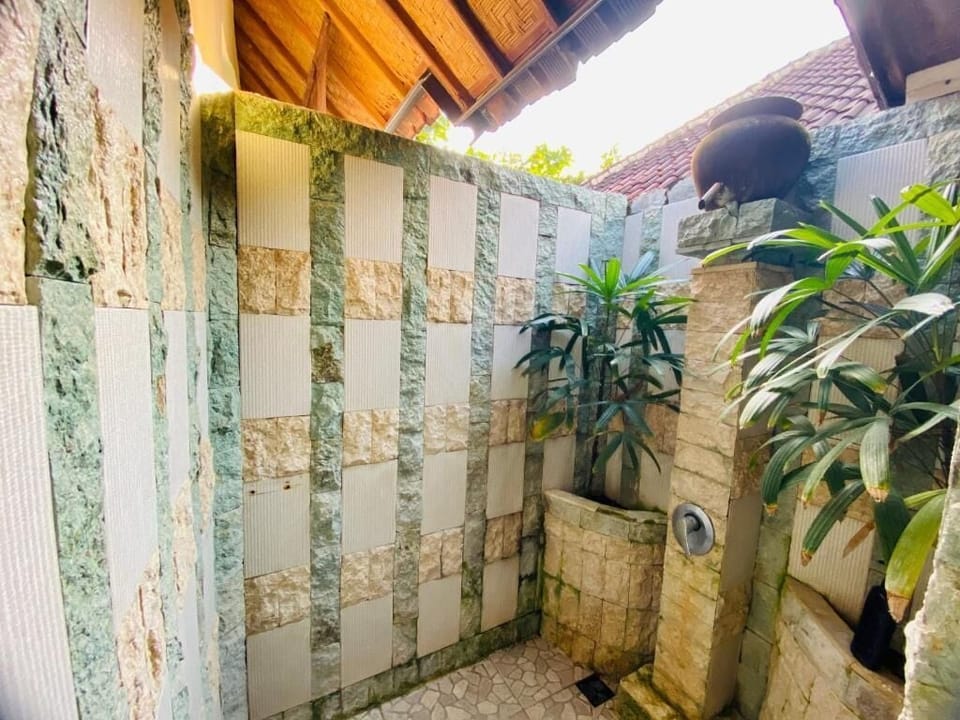 Junior Bungalow, Balcony, Sea View | Property grounds