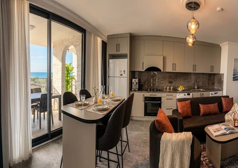 Comfort Suite, Sea View Balcony (2+1) | Private kitchen | Fridge, microwave, oven, dishwasher