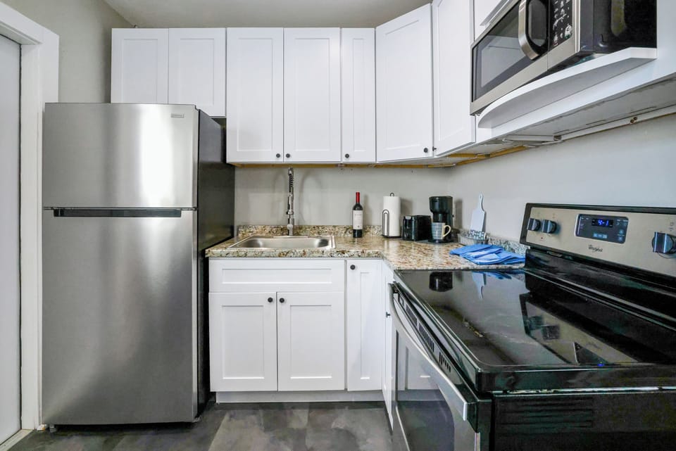 Renovated full bathroom with shower, Bath towels and body soaps provided!