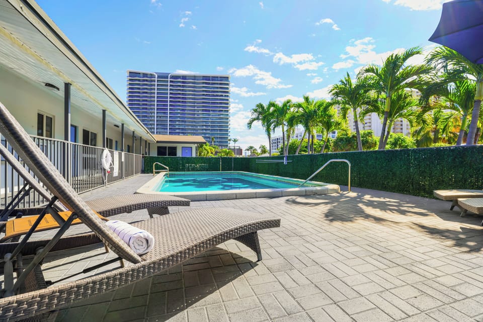 Relax in the heated pool with lounge seating options in the sun or shade