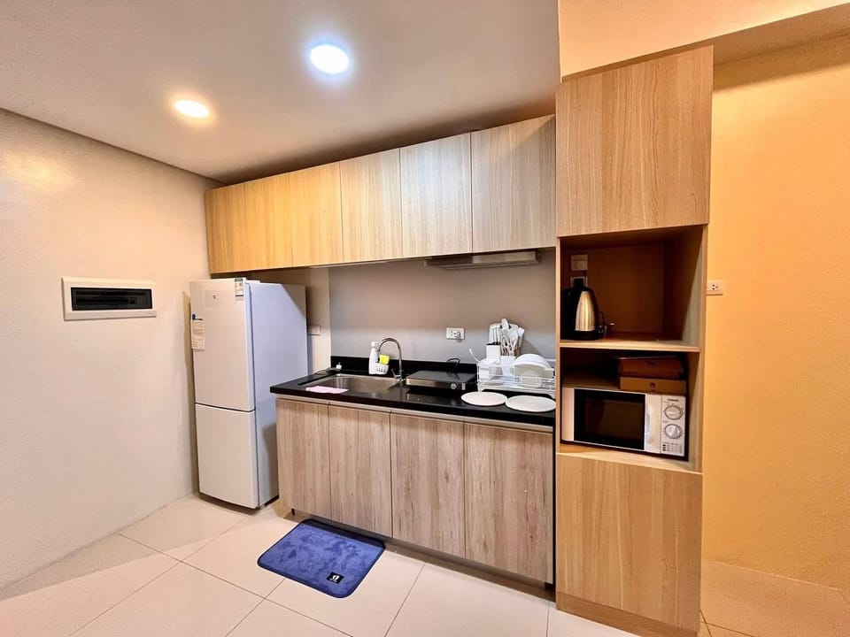 Economy Condo, Balcony, City View | Private kitchen | Fridge, microwave, cookware/dishes/utensils