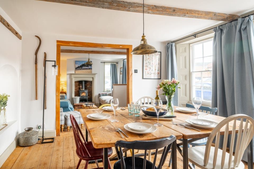 Ground floor: From the dining room an opening leads to the sitting room