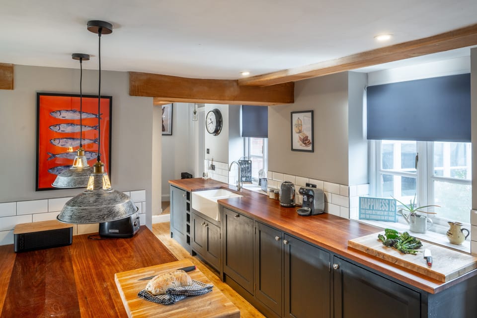 Ground floor: Kitchen with windows overlooking the courtyard