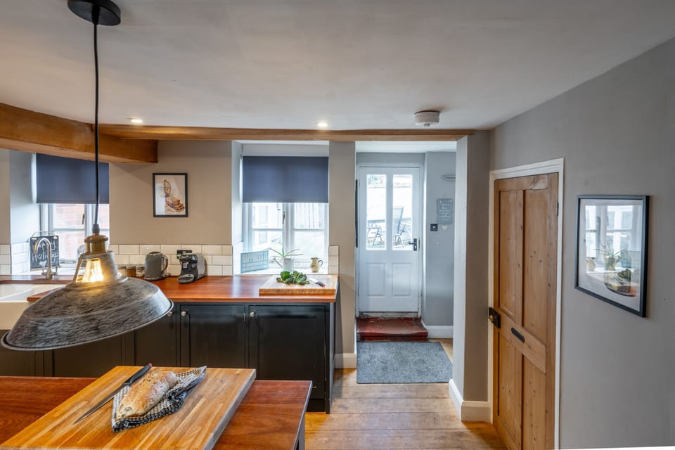 Ground floor: The entrance door leads to a hallway and then to the kitchen