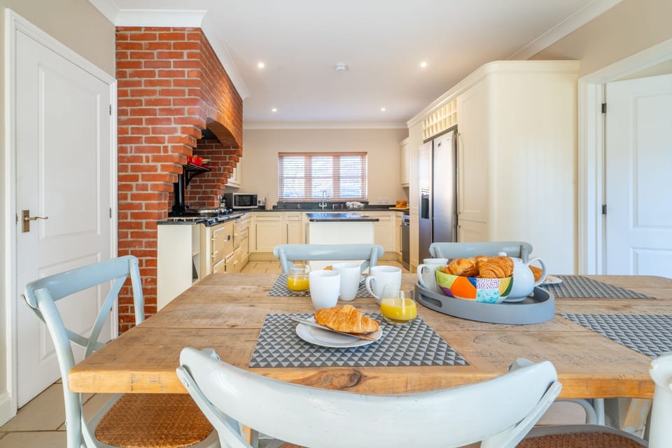 Ground floor: Kitchen / breakfast room with oil-fired Aga, combination microwave that has a grill / oven function, large fridge/freezer, dishwashers, coffee machine and a full inventory of table and kitchenware and breakfast table for six people