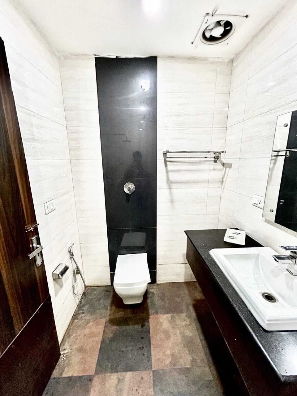 Separate tub and shower, towels, soap, shampoo