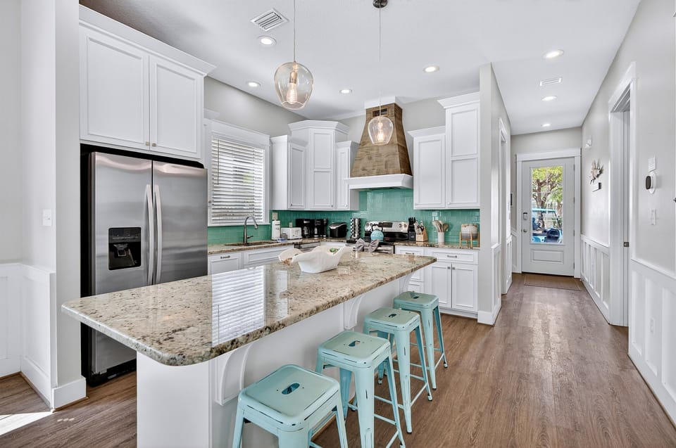 1st Floor - Spacious gourmet kitchen fully stocked with all the cookware and essentials the family chef needs. Enjoy modern appliances, generous prep space, and an open layout perfect for preparing meals, hosting gatherings, and entertaining with ease.