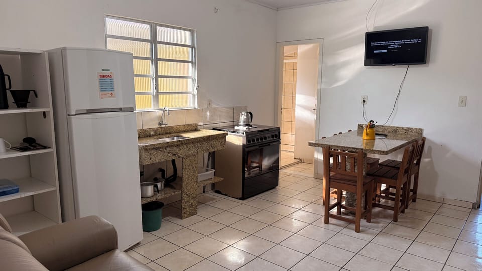 Family Apartment, Courtyard View | Living area | 32-inch flat-screen TV with digital channels