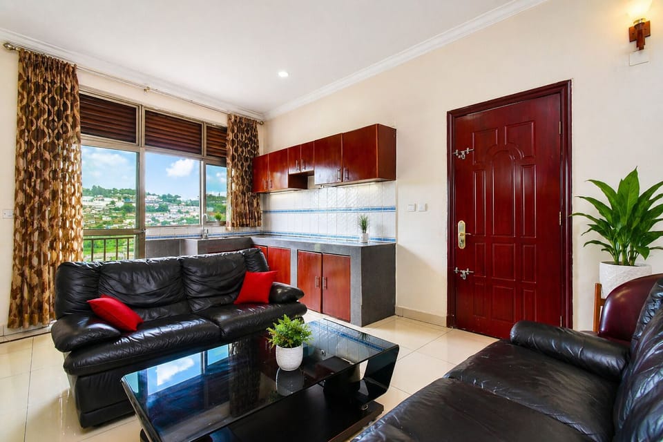 Deluxe Studio, 1 King Bed, Balcony, City View | Living area | 28-inch TV with digital channels