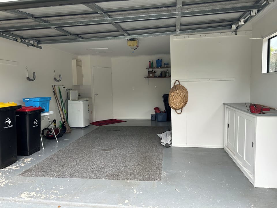 Single garage with storage room and laundry.