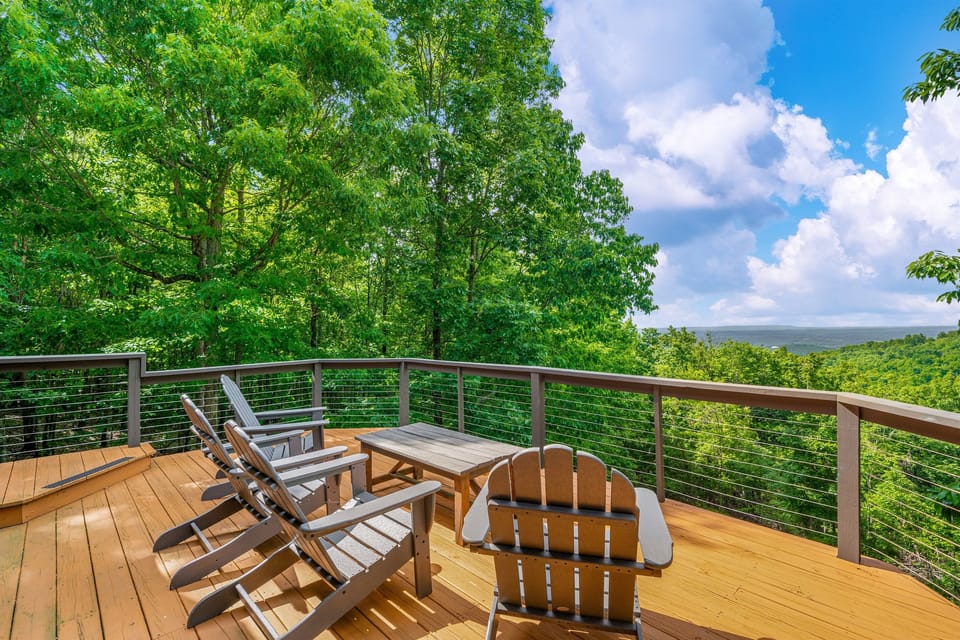Back deck on main level offers brow views and echoes from trains going through Fort Payne below :)