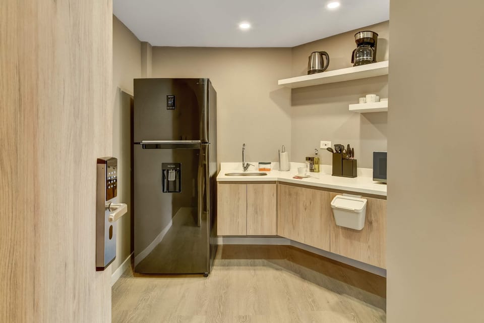 Fully equipped kitchen with modern appliances
