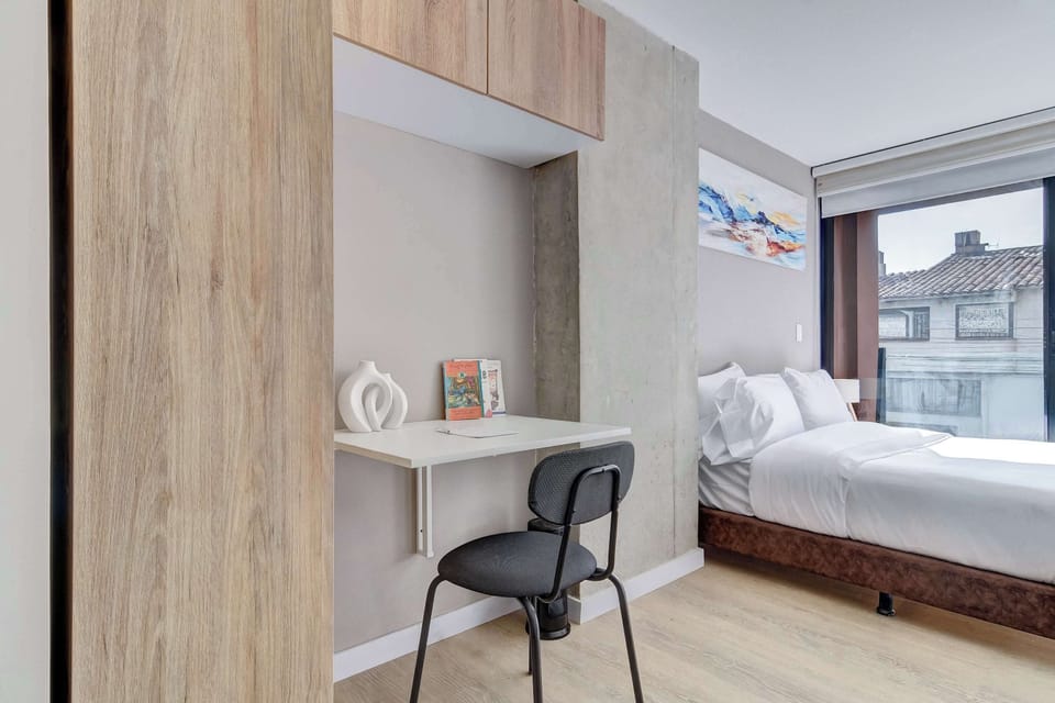 Comfortable bedroom with natural light
