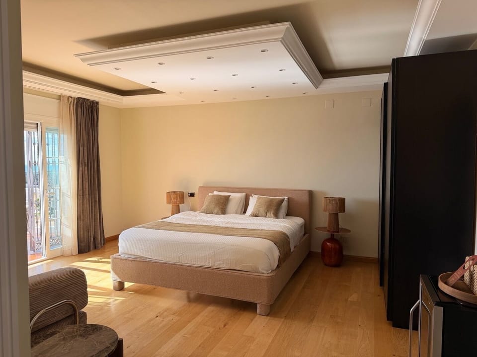 Luxury Suite, Balcony, Sea View | Blackout drapes, iron/ironing board, free WiFi
