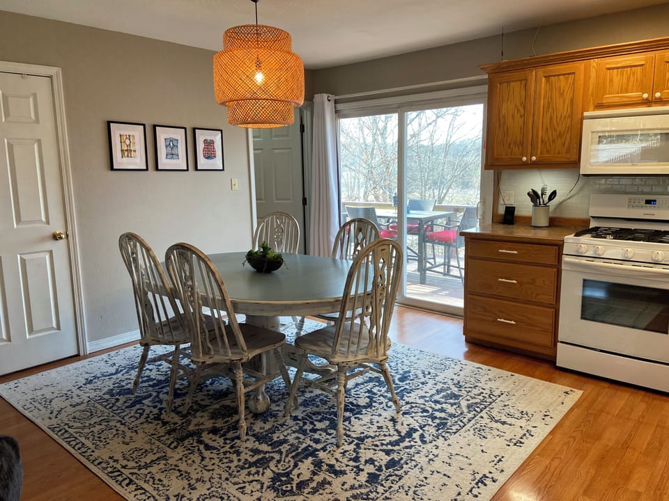 Gather for meals indoors or step outside to the deck.