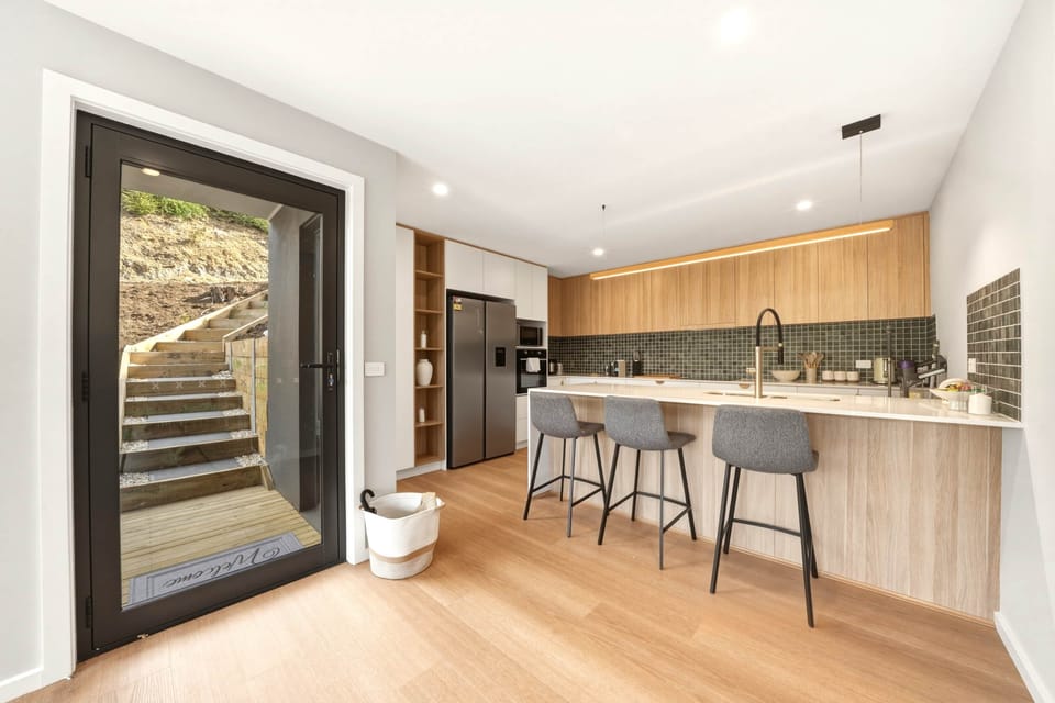Fully equipped kitchen with modern appliances.