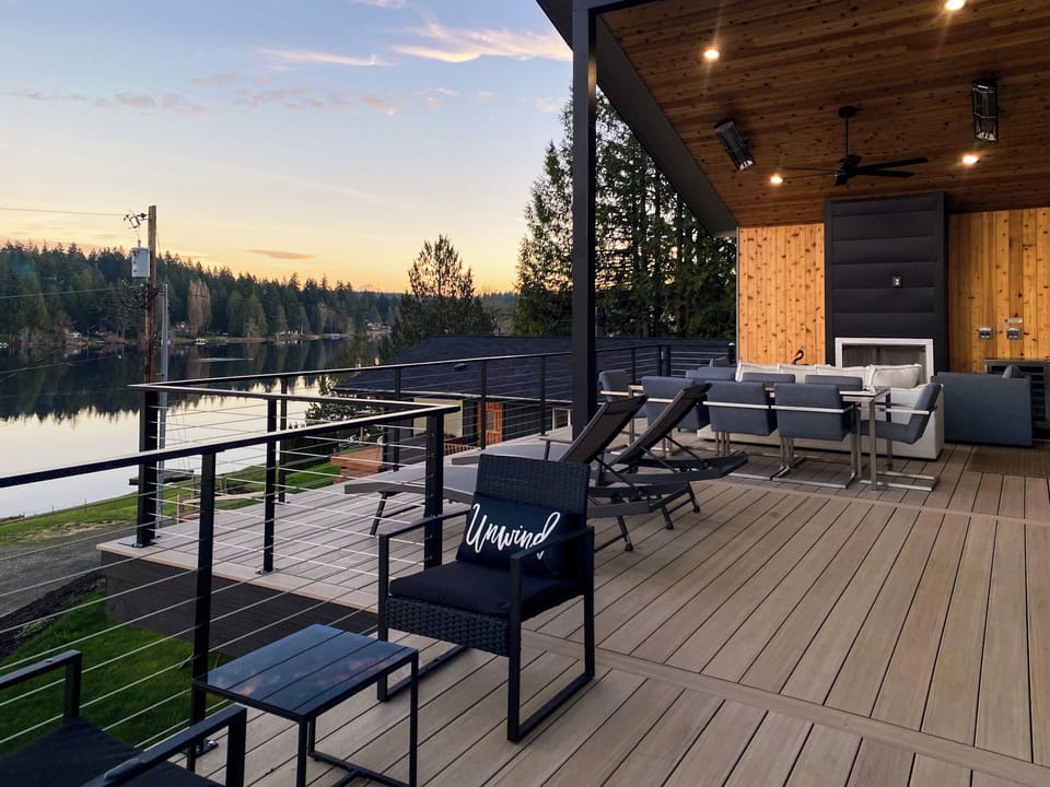 Infrared heat and a warm fireplace melt winter away on this modern luxe deck
