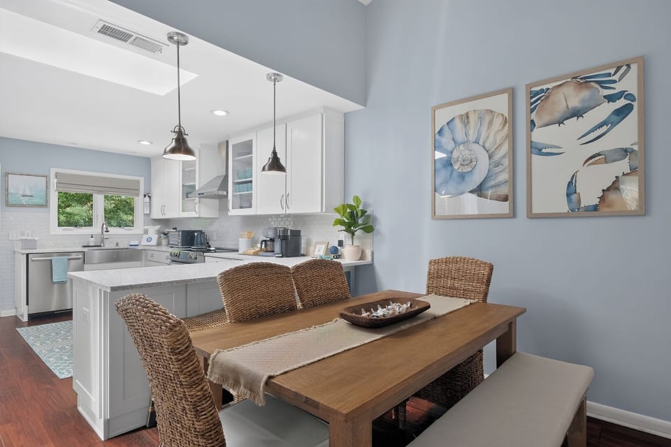 A skylight provides natural kitchen sunlight.  Three skylights in total.