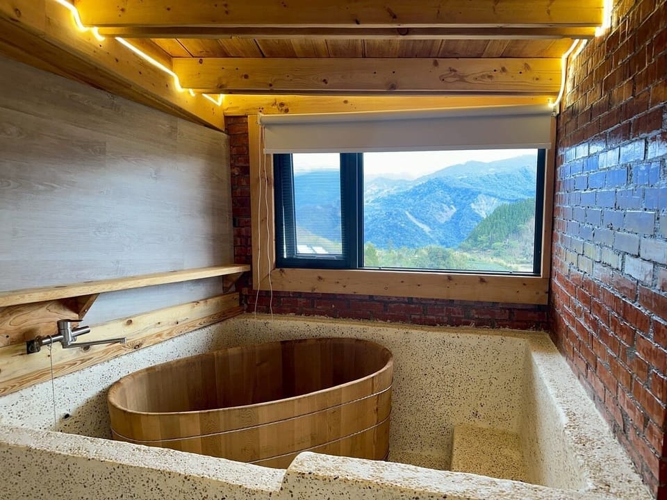 Deluxe Double Room, Mountain View | Bathroom | Shower, hair dryer, toilet paper