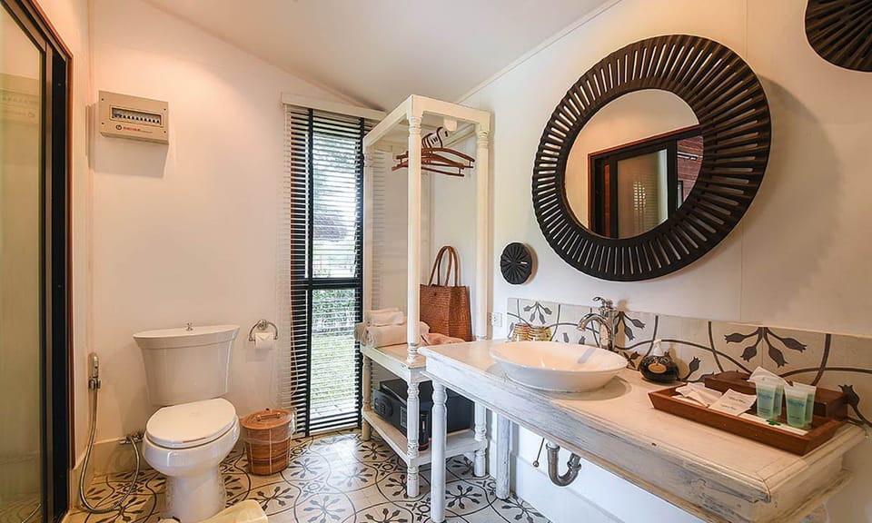 Shower, hair dryer, slippers, towels